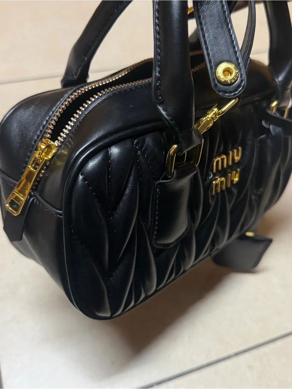 Miu Miu Black Quilted Leather Satchel with Gold Hardware